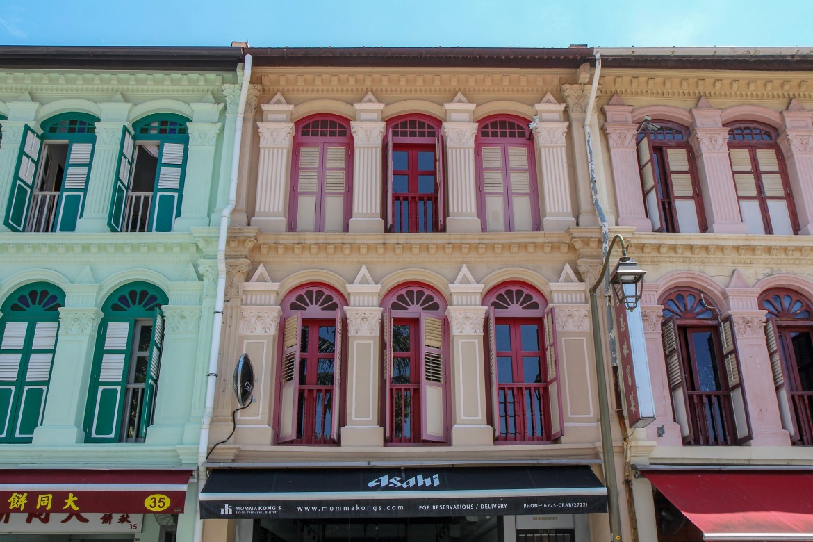Colorful colonial-era shophouse facades in Singapore’s historical district