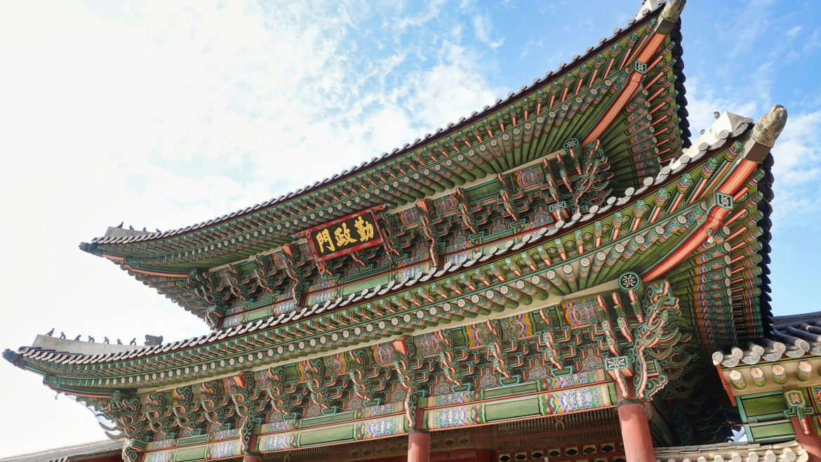 Intricate painted temple roof patterns illustrating craftsmanship in traditional Korean architecture