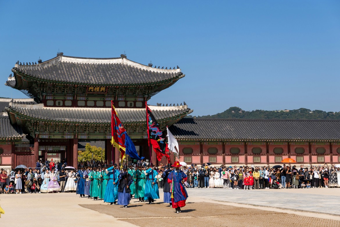 Historic palace gate and guard ceremony representing cultural heritage in Korea